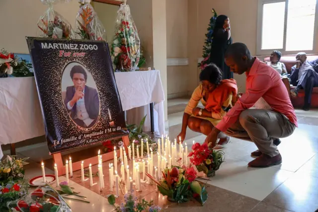 Colleagues mourn Martinez Zogo with a vigil at their office in Yaoundé in January 2023.