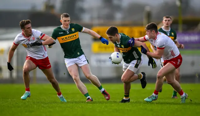 Tyrone's Ben Cullen attempts to challenge Kerry's Adrian Spillane