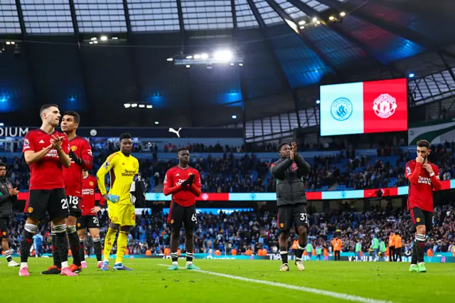 Dejected Manchester United players react at full time applauding the Manchester United fans
