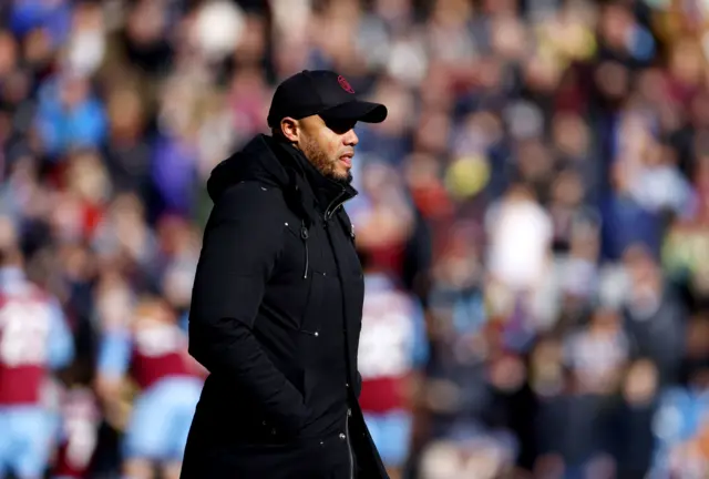 Vincent Kompany looks on