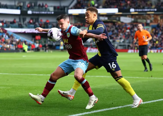 Josh Cullen in action with AFC Bournemouth's Marcus Tavernier