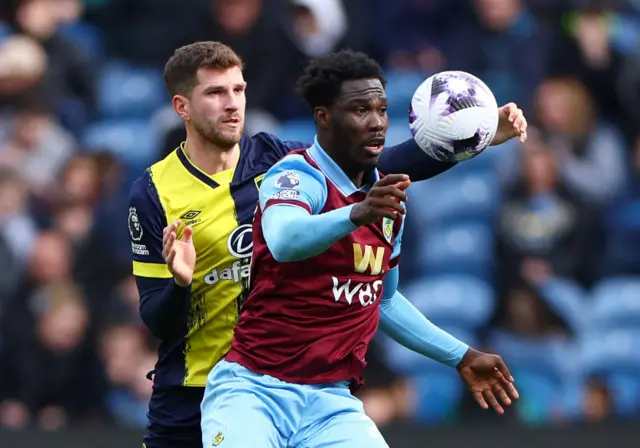 David Fofana controls the ball under pressure with Chris Mepham
