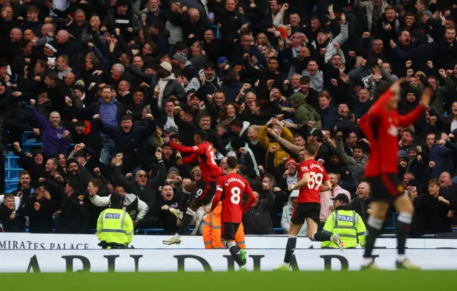 Marcus Rashford celebrates scoring their first goal with Bruno Fernandes
