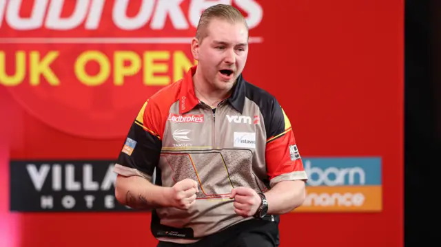 Dimitri Van den Bergh celebrates