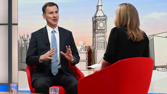 Jeremy Hunt sits and speaks with Laura Kuenssberg