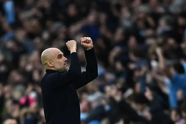 Pep Guardiola celebrates