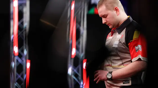 Dimitri Van den Bergh prepares to throw