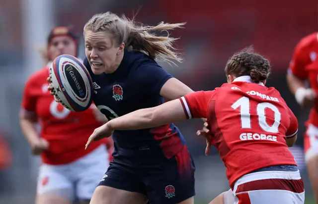 Zoe Aldcroft of England is tackled by Lleucu George