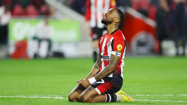 Ivan Toney on his knees