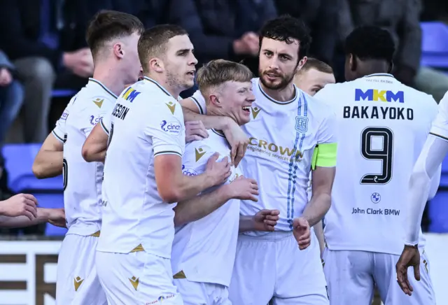 Lyall Cameron celebrates his goal with Dundee teammates