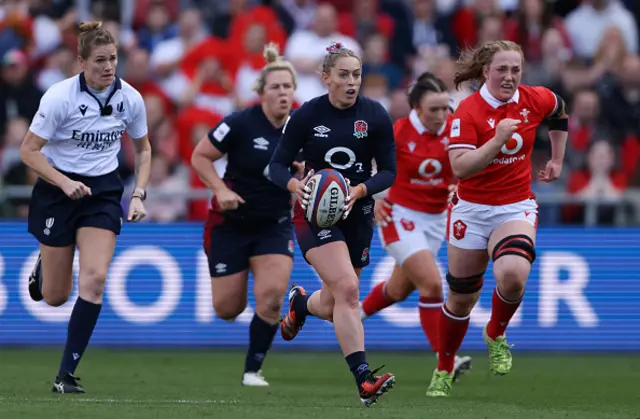 Natasha Hunt runs with the ball