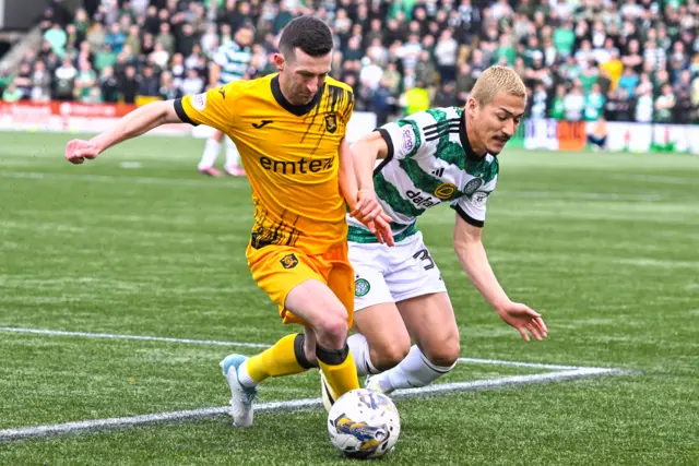 Livingston midfielder Jason Holt and Celtic winger Daizen Maeda