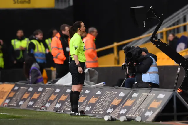 The referee checks the VAR screen