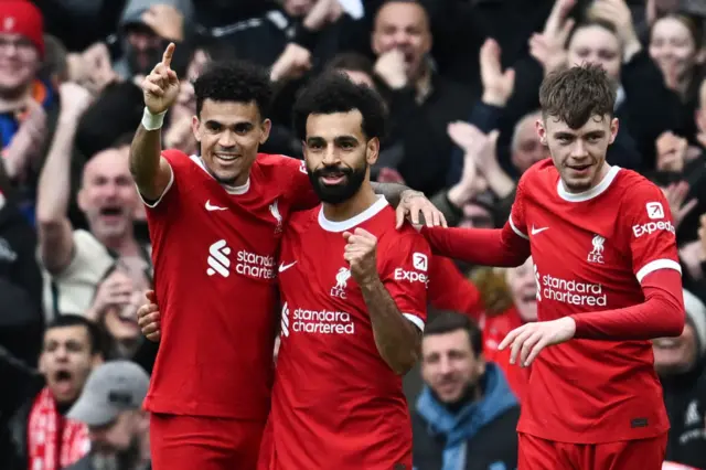 Luis Diaz, Mohamed Salah and Conor Bradley celebrating