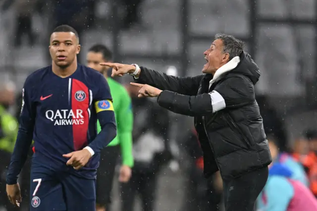 Kylian Mbappe and Luis Enrique