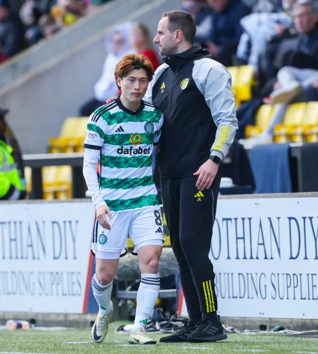 Celtic's Kyogo Furuhashi with assistant manager John Kennedy