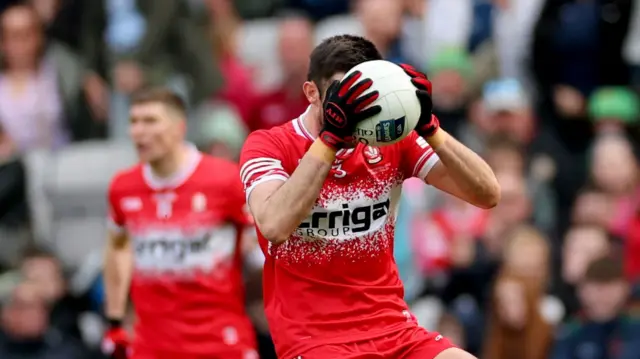 Chrissy McKaigue reacts as Dublin are awarded late free to send the game to extra time