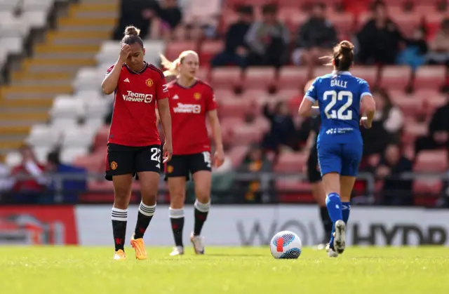 Nikita Parris scratches her head as Everton run back to kick off after their goal