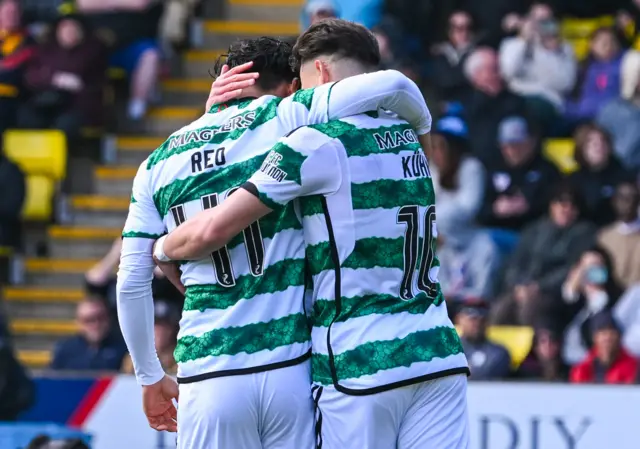 Celtic's Reo Hatate celebrates with Nicolas Kuhn