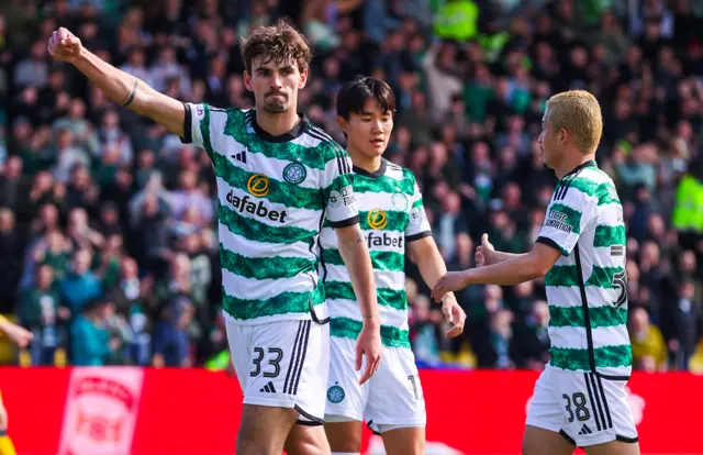 Matt O'Riley celebrates scoring for Celtic against Livingston