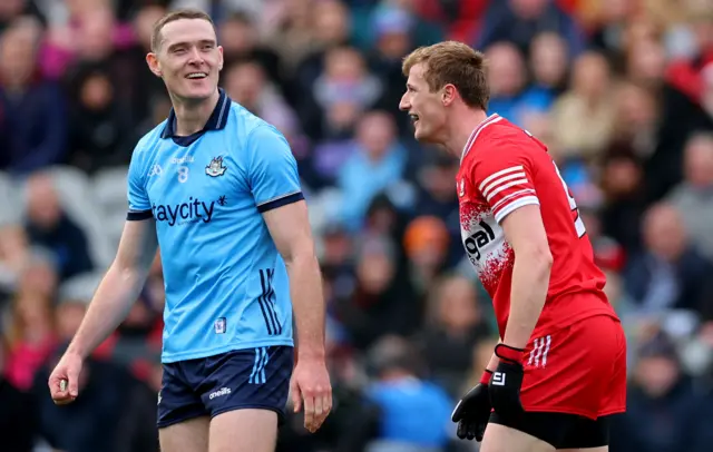 Dublin's Brian Fenton shares a joke with Brendan Rodgers