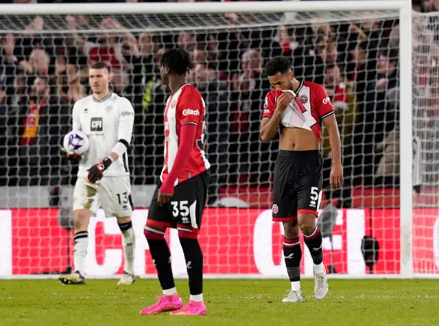 Auston Trusty of Sheffield United looks on