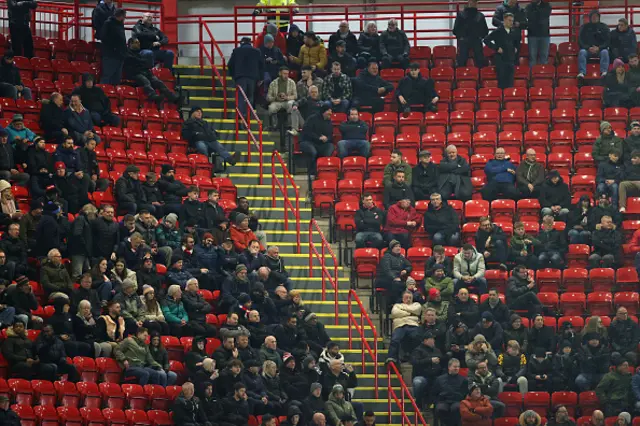 Empty seats are seen inside the stadium