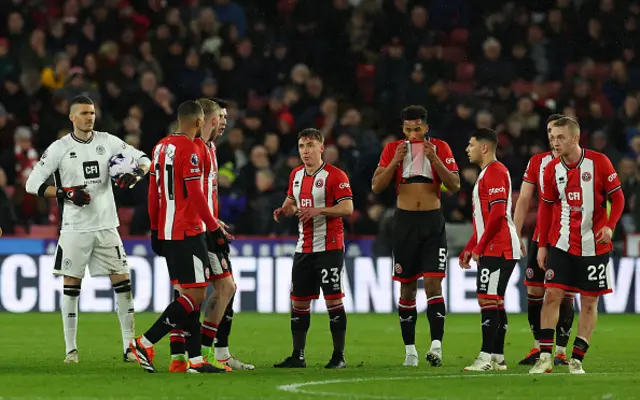 Sheffield United's players look on dejected