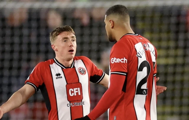 Ben Osborn and Yasser Larouci look dejected