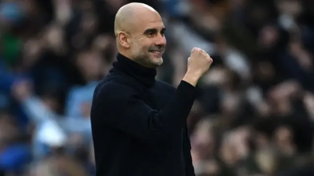 Pep Guardiola celebrates