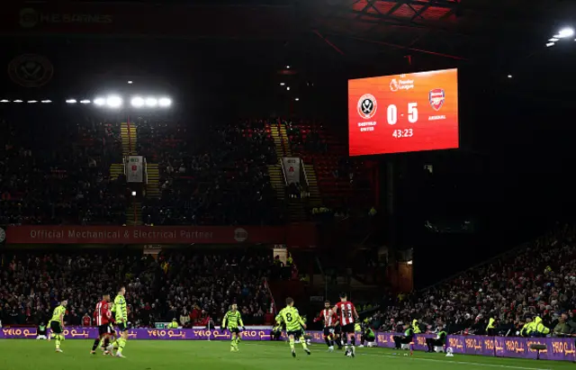 Scoreboard shows 5-0 score before half-time