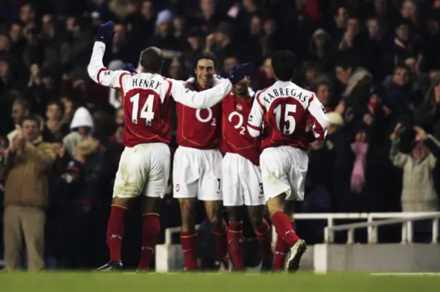 Thierry Henry, Robert Pires, Ashley Cole and Fabregas celebrate a goal while playing for Arsenal