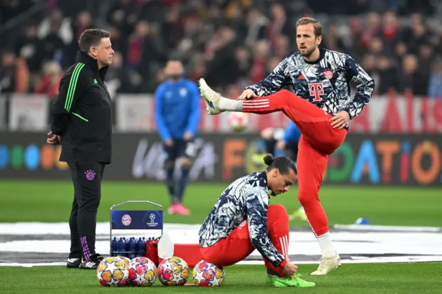 Sane and Kane warm up at the Allianz.