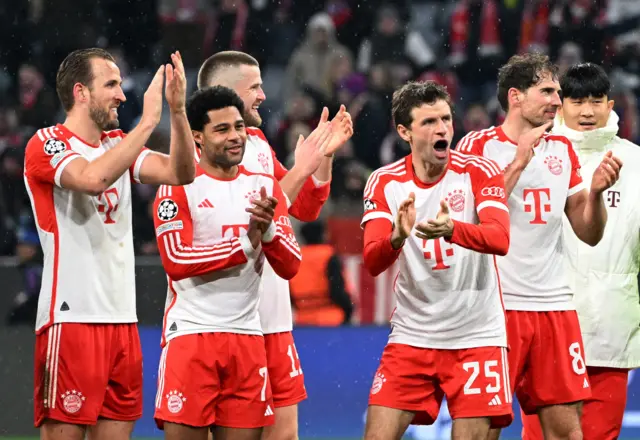 Bayern players celebrate at full time.