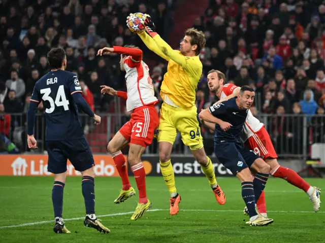 Provedel gathers the ball above Muller.