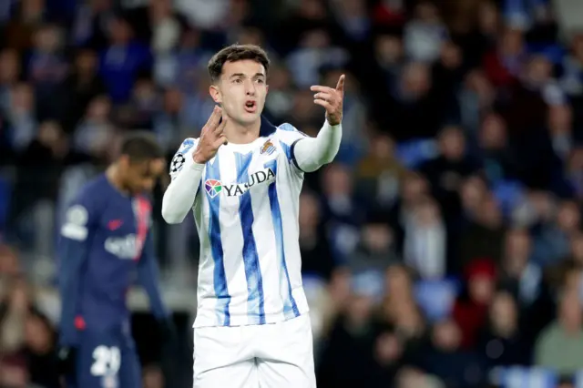 Zubimendi gestures instructions to his teammates.