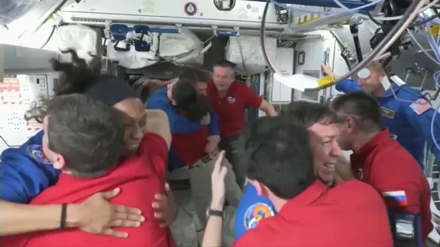 Newcomers meet the existing crew onboard the International Space Station