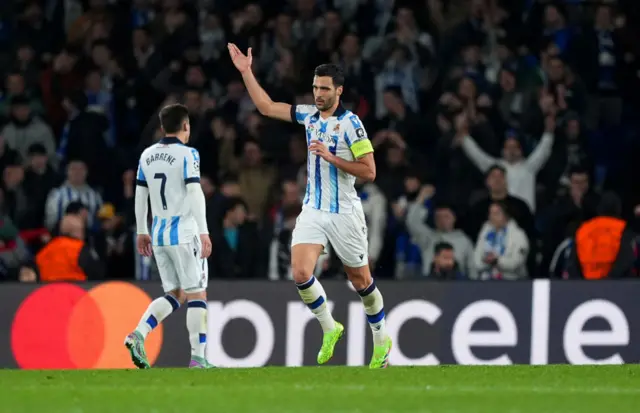 Mikel Merino celebrates scoring for Sociedad late on.