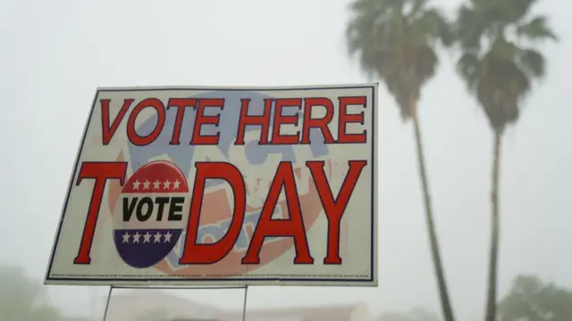 A sign directing people to a polling location is seen during the Super Tuesday primary election in Rio Grande City, Texas, U.S., March 5, 2024. REUTERS/Cheney Orr