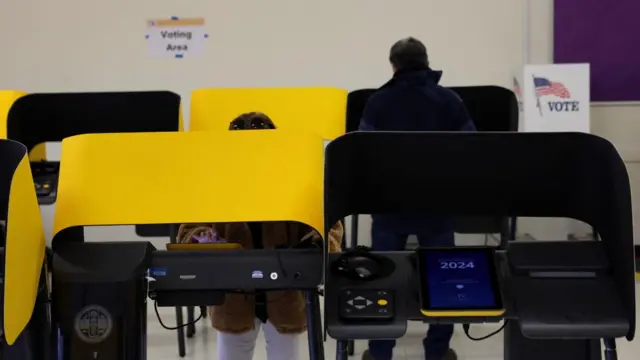 People vote during the Super Tuesday primary election in Burbank, California, U.S., March 5, 2024