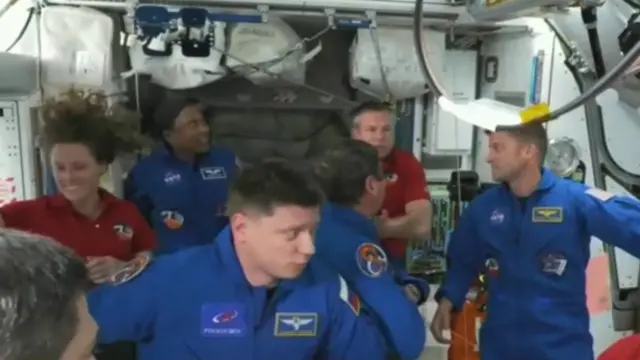 Newcomers meet the existing crew onboard the International Space Station