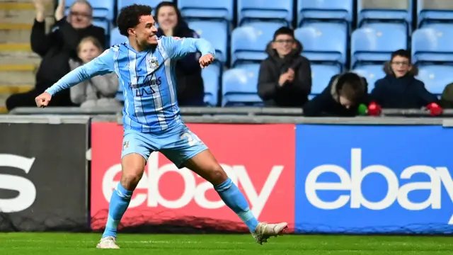 Joel Latibeaudiere celebrates scoring