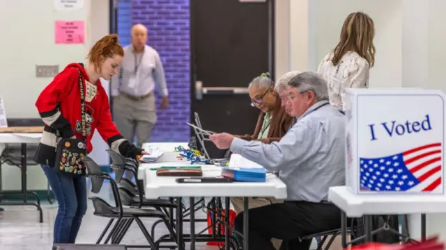 Voters arrive and check in on Super Tuesday at Mt. Moriah Primitive Baptist Church, Mecklenburg County, in Charlotte, North Carolina