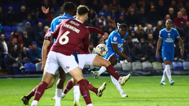 Peterborough United midfielder Kwame Poku (11) bends a shot into the corner during the EFL Sky Bet League 1 match between Peterborough United and Northampton Town