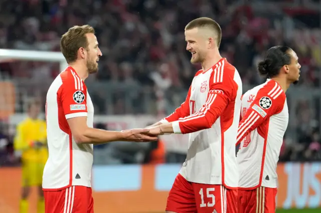 Kane and Dier celebrate Bayern taking the lead v Lazio.