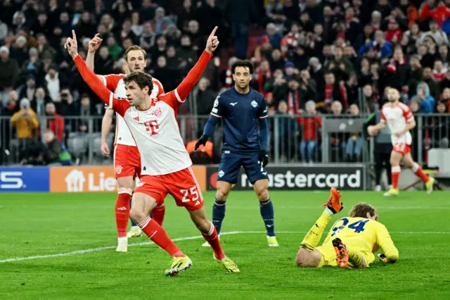 Muller celebrates giving his side the lead before the break.