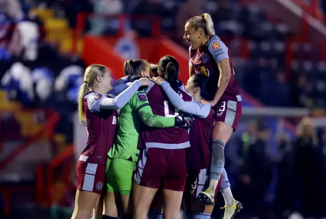 Aston Villa celebrate their penalty shootout win over Brighton.