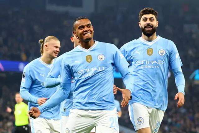 Manuel Akanji celebrates scoring for Man City