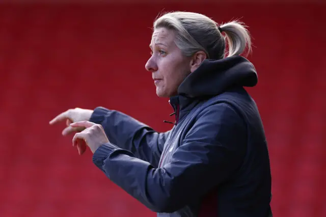 Carla Ward gives instructions from the sideline.