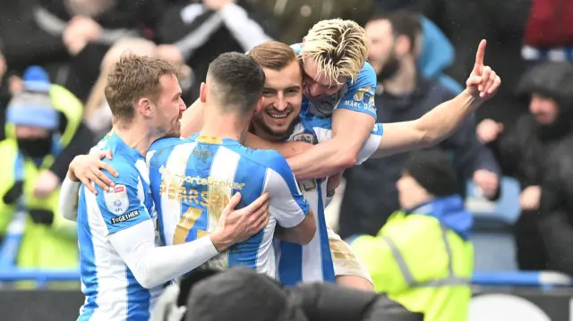 Huddersfield celebrate against Leeds